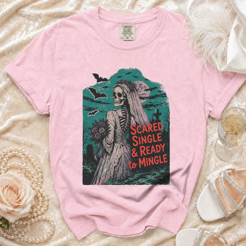 Pink t-shirt with skeleton bride graphic and text "Scared Single & Ready to Mingle".