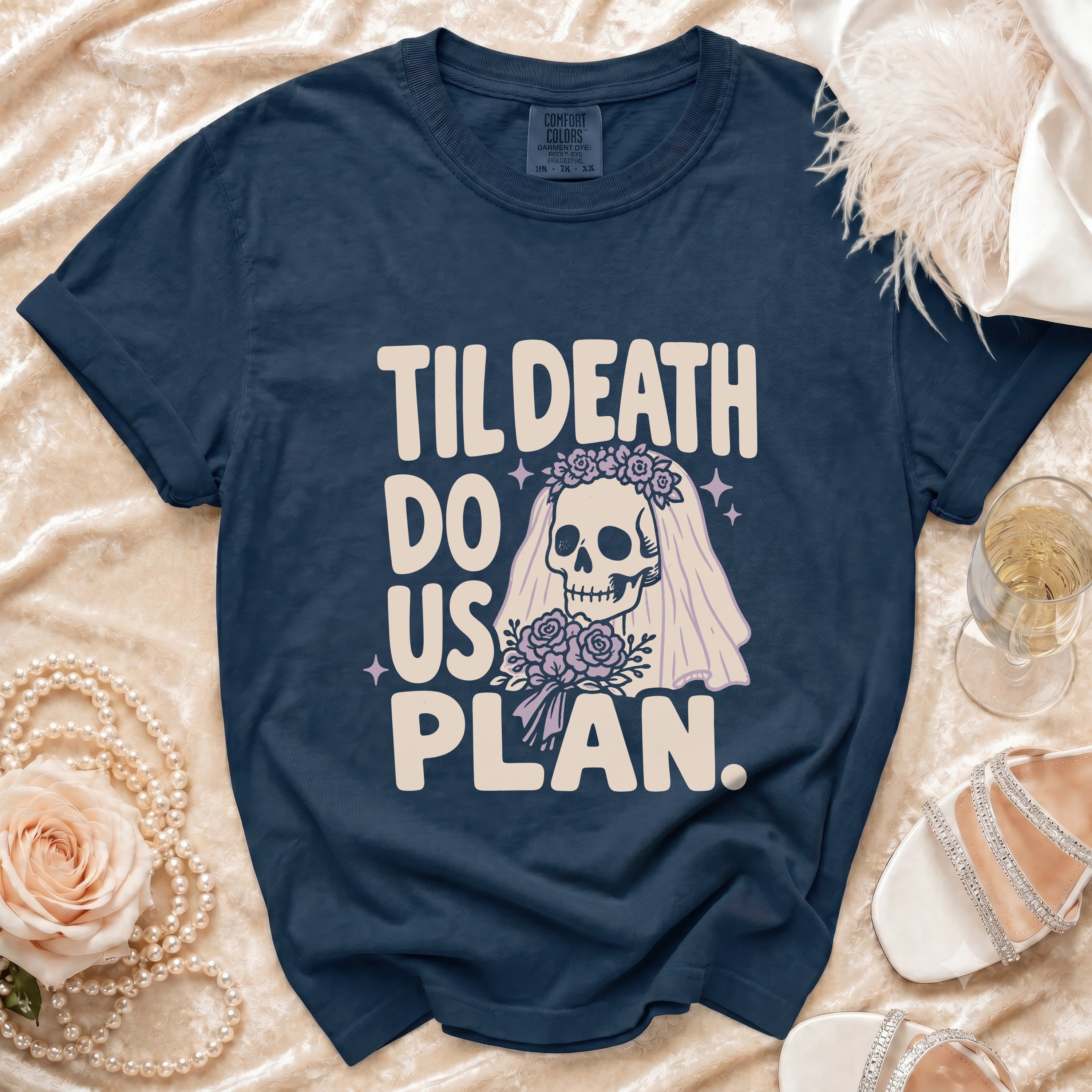 Navy t-shirt with "Til Death Do Us Plan" text and skull graphic.