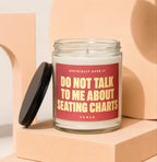Glass candle with red label reading "DO NOT TALK TO ME ABOUT SEATING CHARTS".