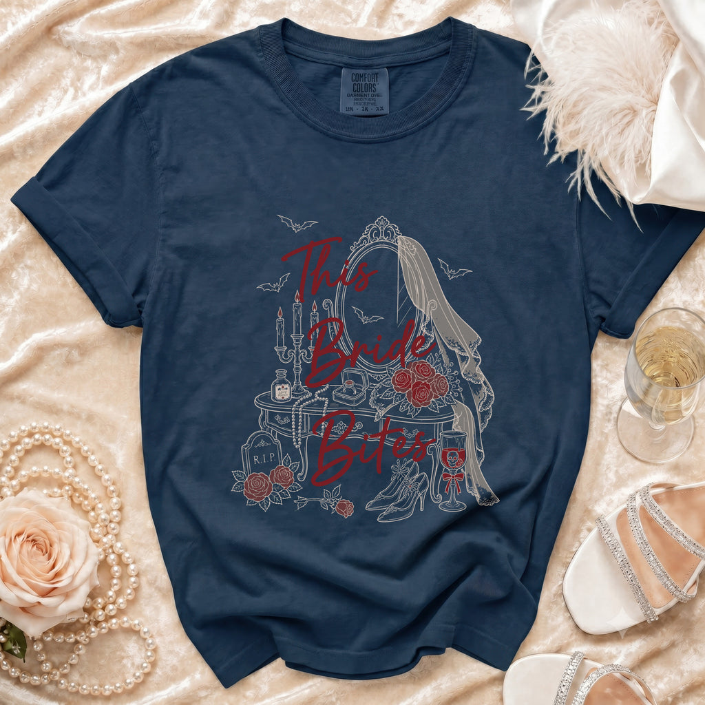 Navy t-shirt with "This Bride Bites" gothic wedding design and Comfort Colors tag.