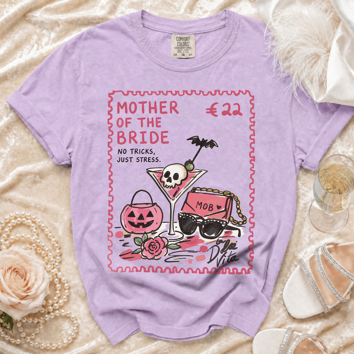 Purple t-shirt with "Mother of the Bride" and spooky cocktail graphic.