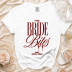 White t-shirt with "THIS BRIDE Bites ONLY GOOD VIBES" text.