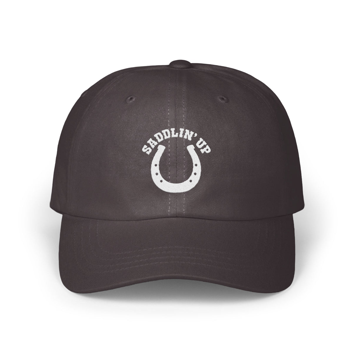 Dark gray baseball cap with an embroidered white horseshoe design and the text SADDLIN UP.
