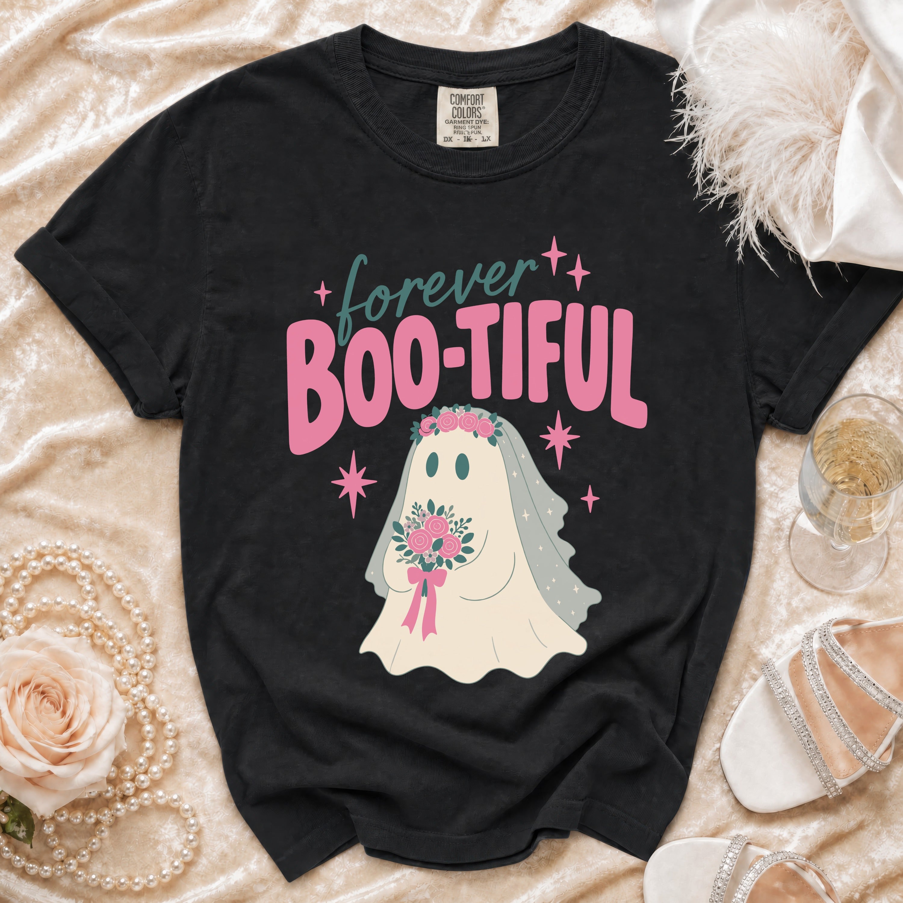 Black t-shirt with ghost bride graphic saying "Forever Boo-tiful" and wedding accessories.