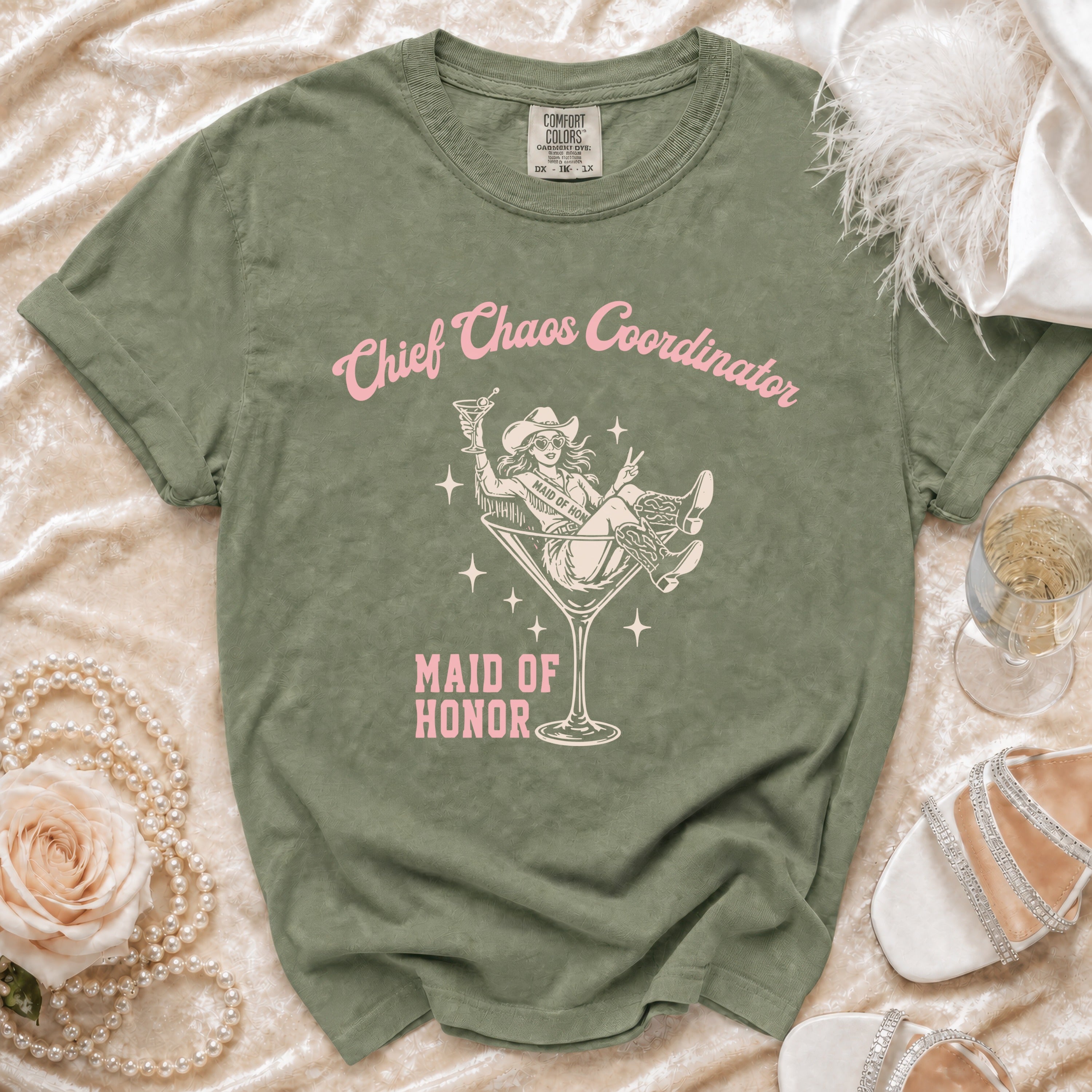 Green t-shirt with pink text: "Chief Chaos Coordinator" and "Maid of Honor" with cowgirl graphic.