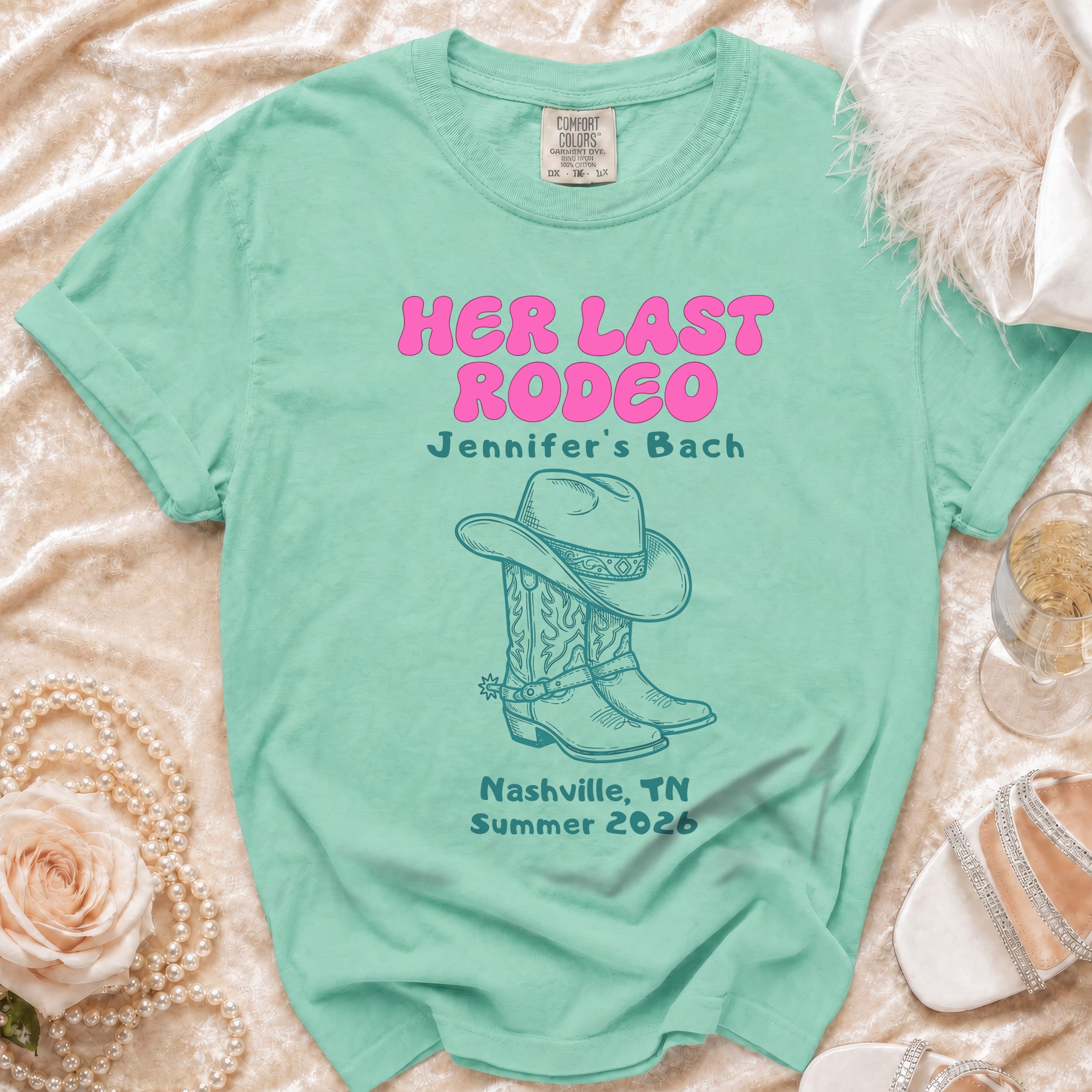 Mint t-shirt with "Her Last Rodeo" and cowboy boots for Jennifer's Bach in Nashville.