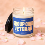 Candle with blue label reading "RANK: GROUP CHAT VETERAN".
