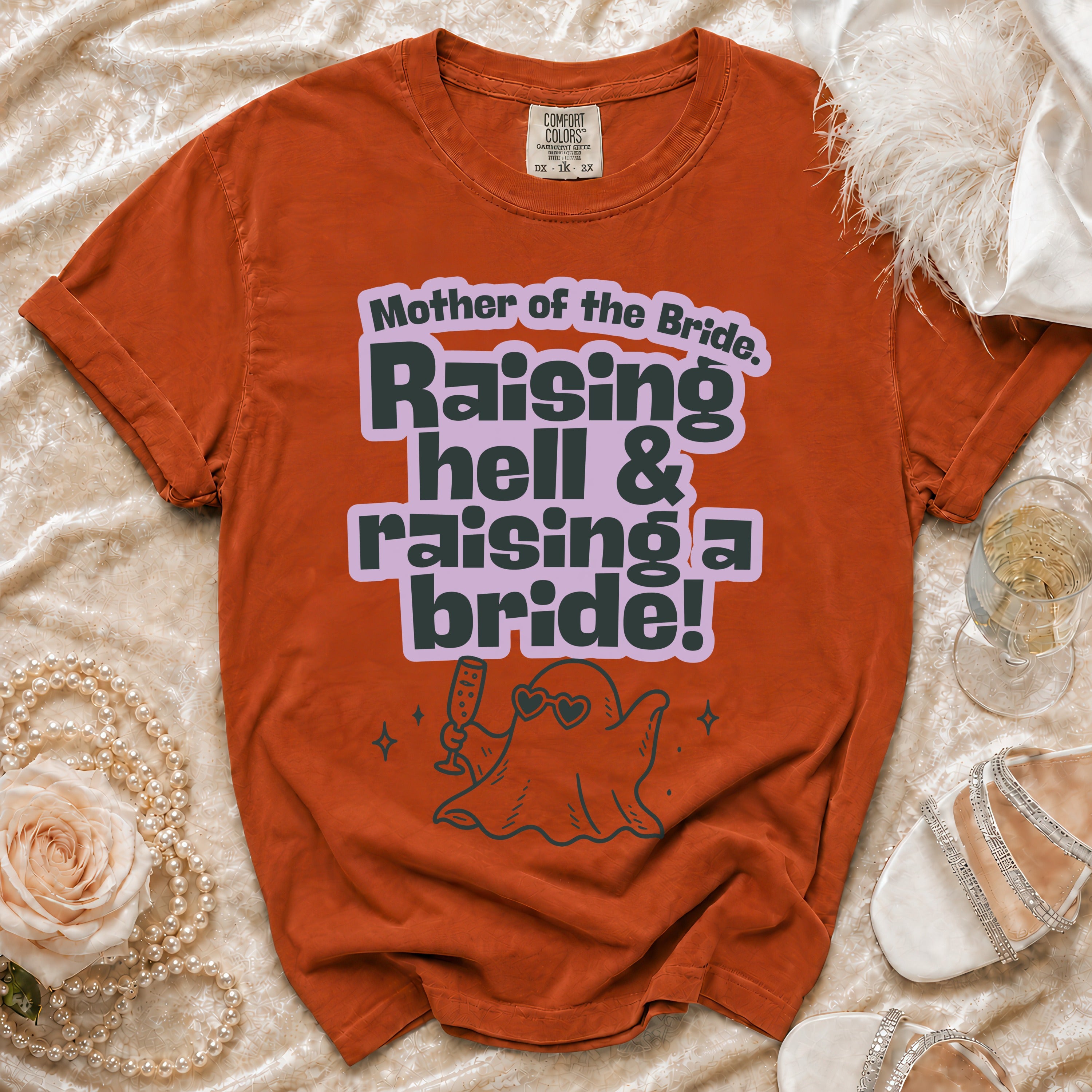 Orange t-shirt with "Mother of the Bride. Raising hell & raising a bride!" text and ghost graphic.