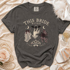 Dark gray t-shirt with "This Bride Bites" text and gothic bridal graphics.