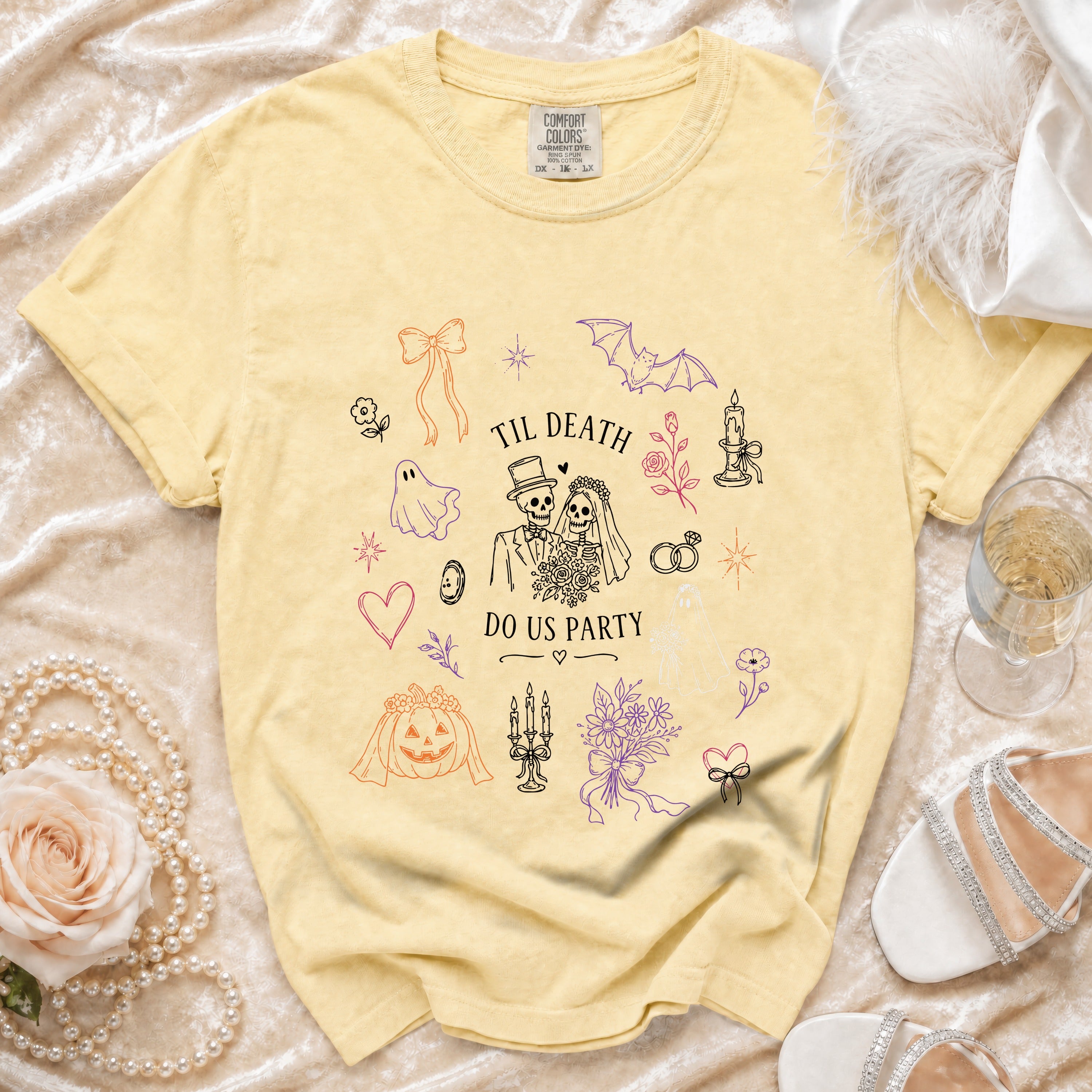Yellow Comfort Colors t-shirt with "Til Death Do Us Party" text and spooky wedding graphics.