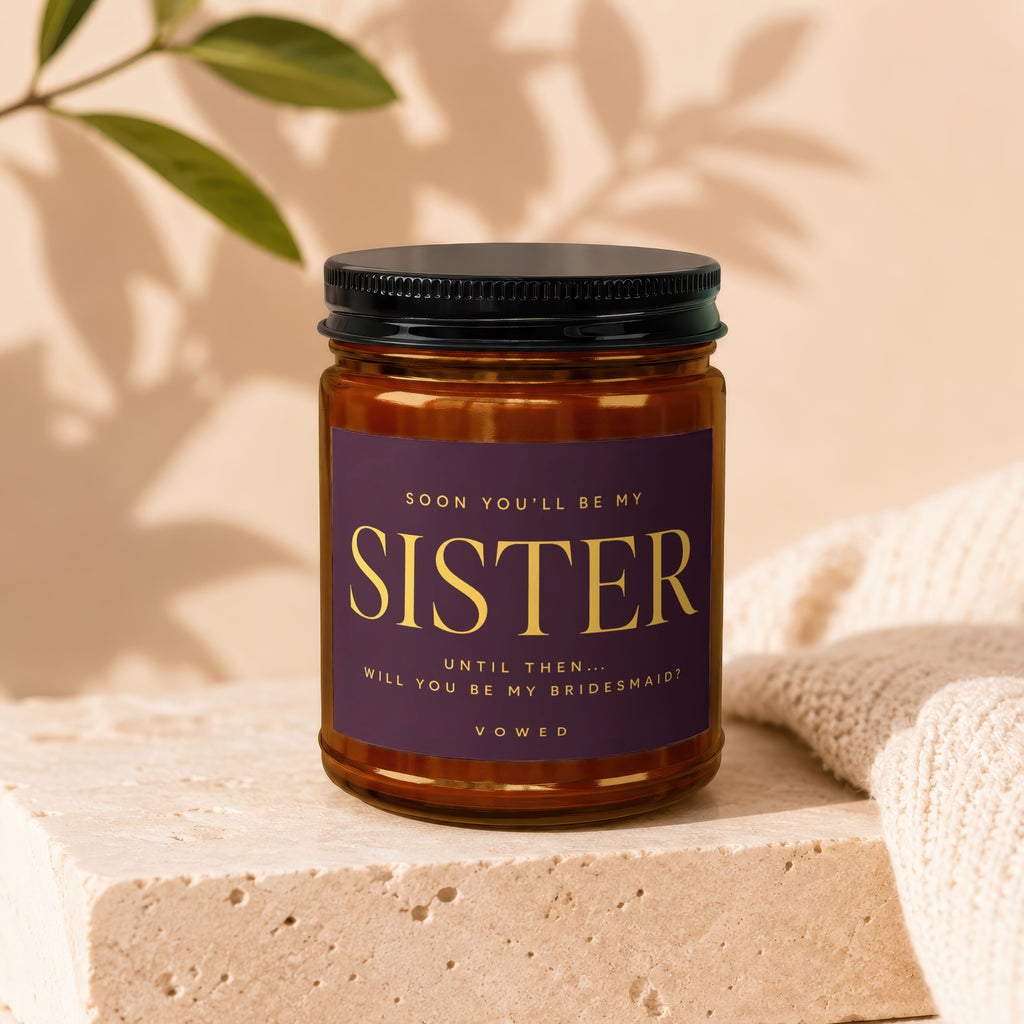 Brown candle with text asking "Will You Be My Bridesmaid?" for a sister.