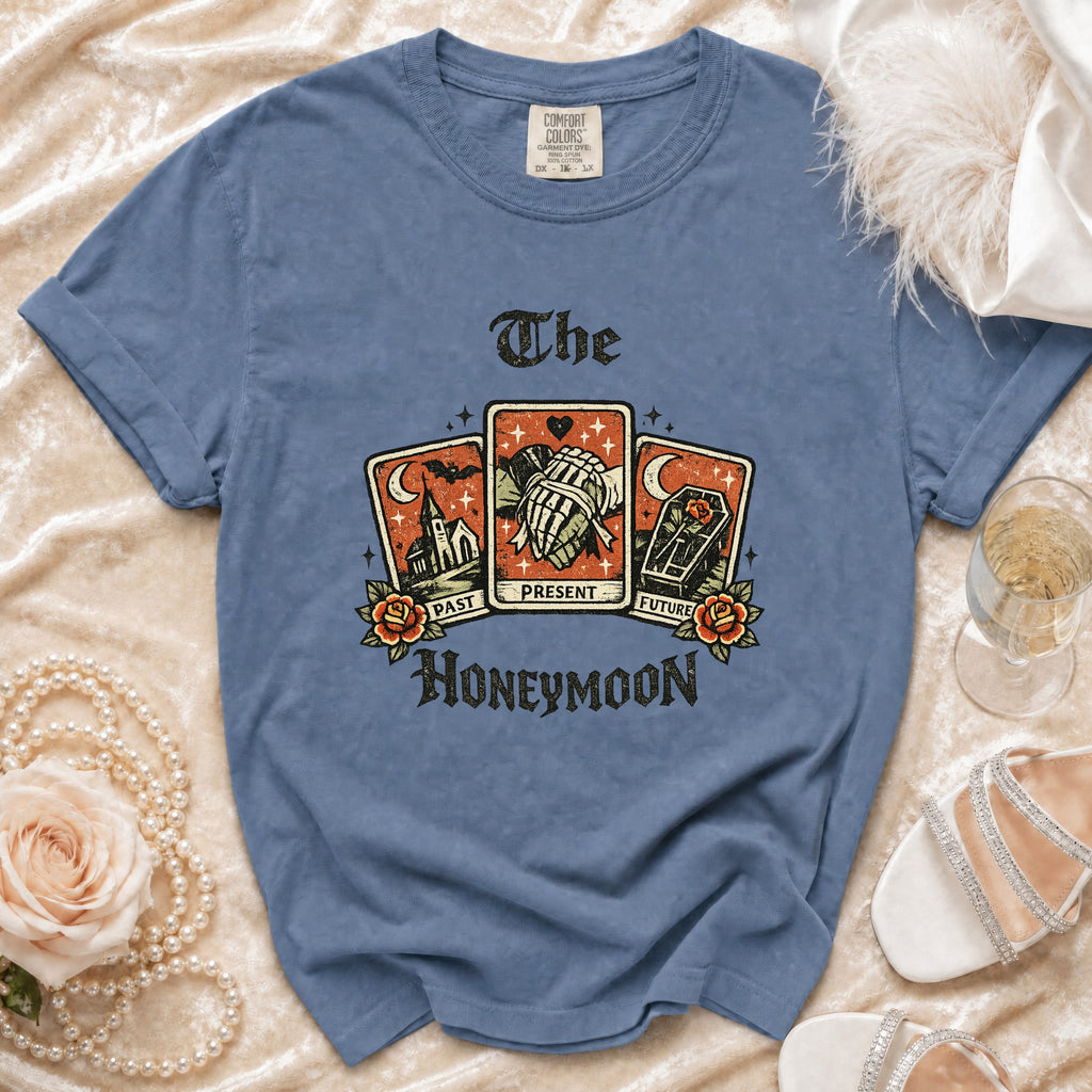 Blue t-shirt with "The Honeymoon" text and tarot card graphic of past, present, and future.