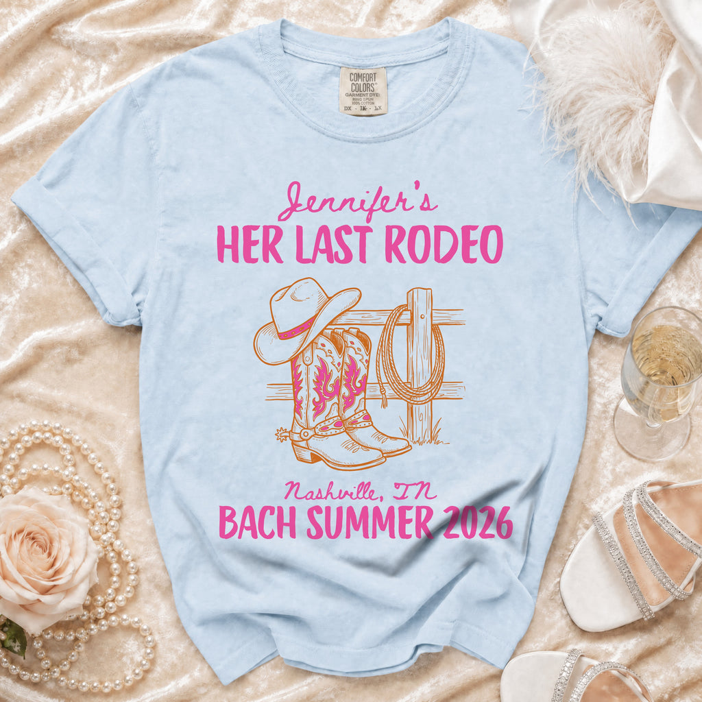 Light blue t-shirt with "Jennifer's Her Last Rodeo" graphic and "Nashville, TN Bach Summer 2026".