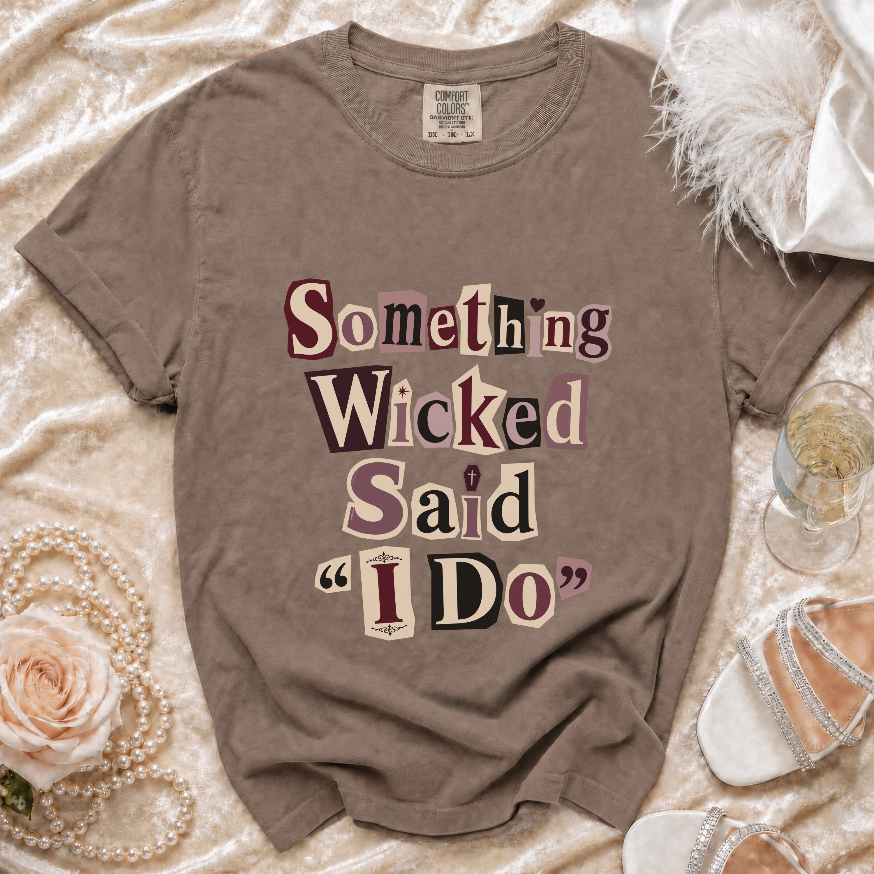 Comfort Colors t-shirt with "Something Wicked Said I Do" text in cutout letters.
