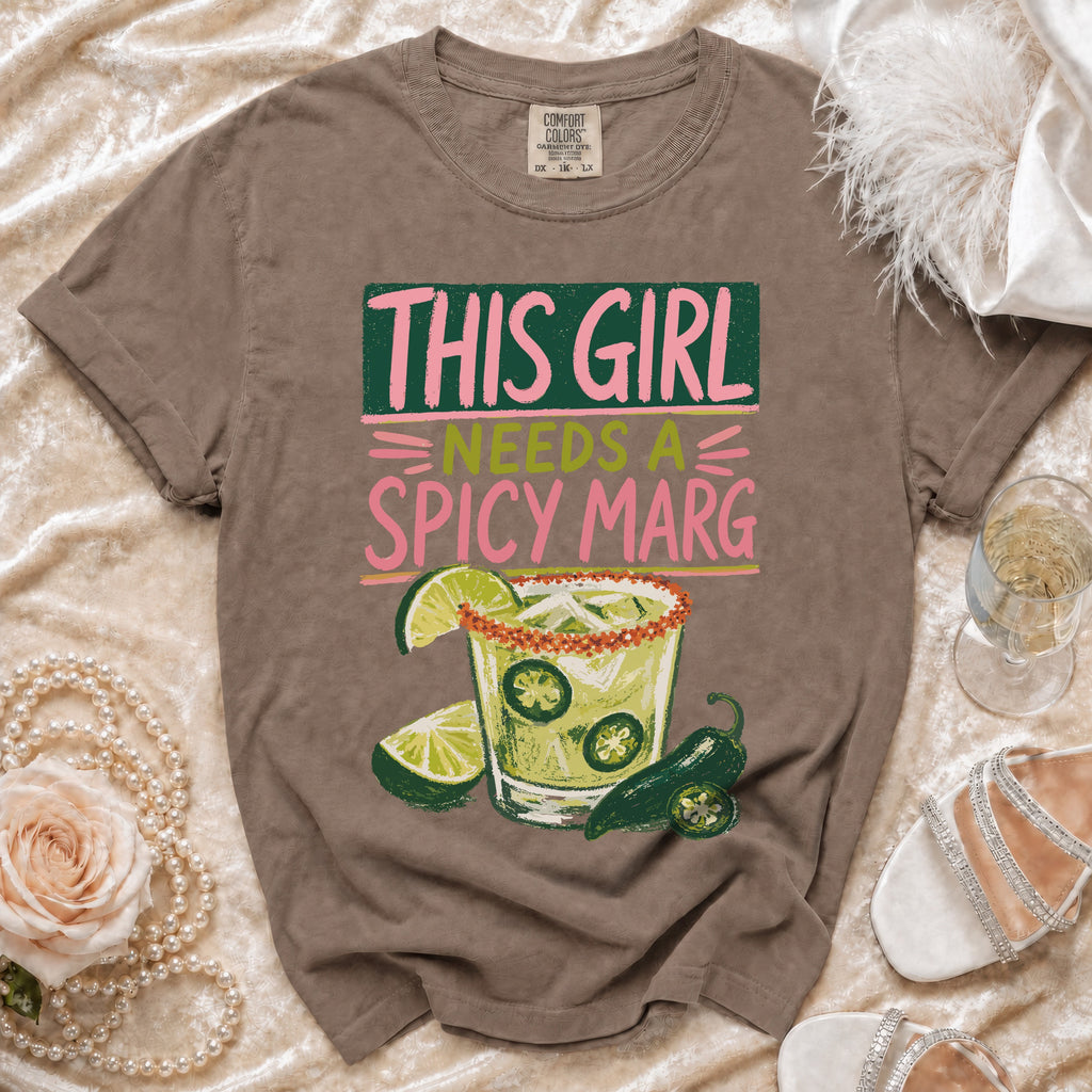 Brown t-shirt with "THIS GIRL NEEDS A SPICY MARG" graphic and a margarita.