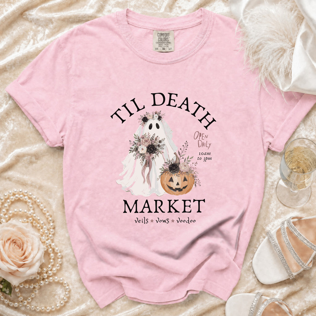 Pink t-shirt with "Til Death Market" text, a floral ghost, and pumpkin graphic.