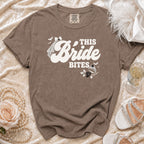 Brown t-shirt with "This Bride Bites" graphic, veil, bats, and skull ring.