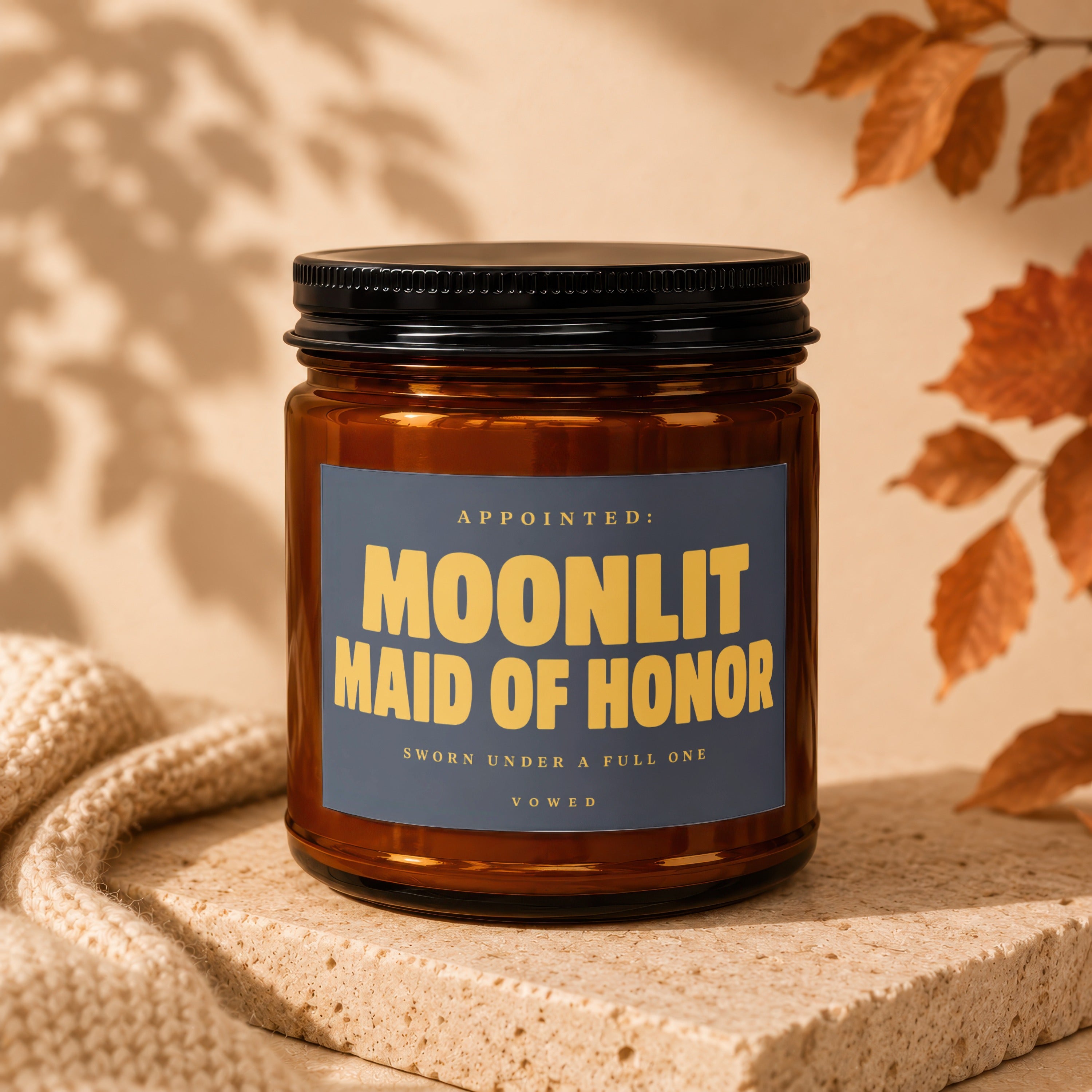 Amber jar candle labeled "Moonlit Maid of Honor" with text "Sworn Under A Full One Vowed".