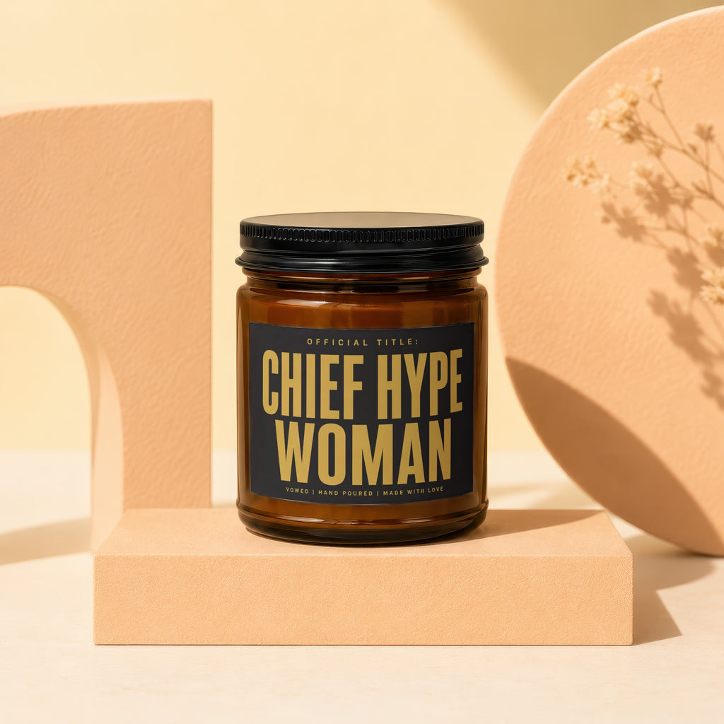 Amber candle with "CHIEF HYPE WOMAN" text, hand-poured.