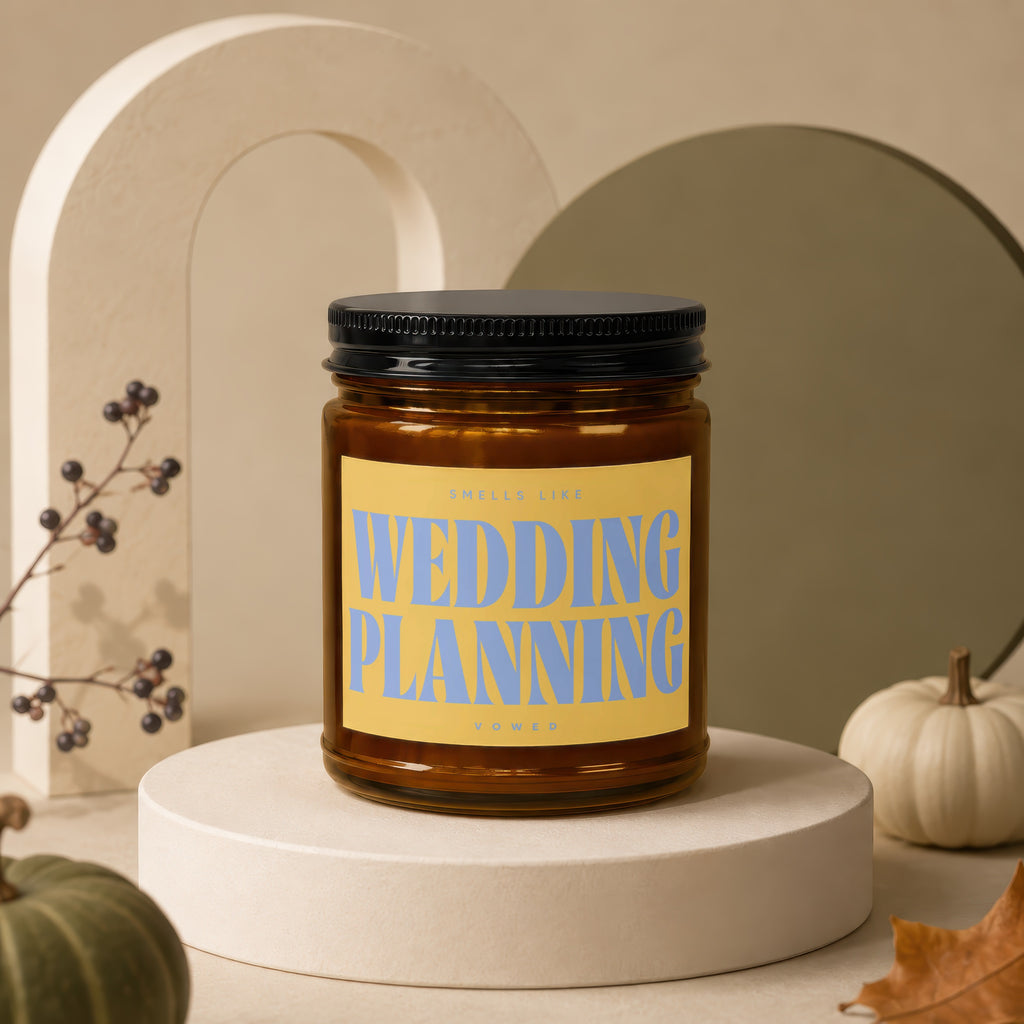 Candle jar with "Wedding Planning" text on yellow label.