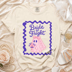 Light-colored t-shirt with a pink ghost bride graphic reading "Bride of Fright."
