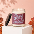 Jar candle with "Proud parent of a newlywed vowed" text in white.