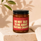 Brown jar with black lid, red label saying "Do Not Talk To Me About Seating Charts".