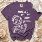 Purple t-shirt with skeleton bride graphic reading "Mother of the Bride Til Death Do Us Party."