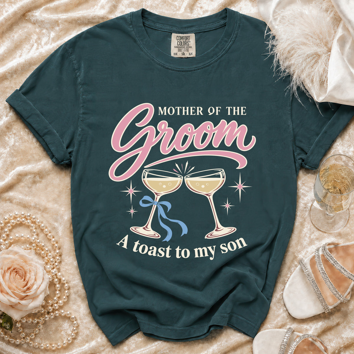 Mother of the Groom t-shirt with champagne glasses and "A toast to my son" text.