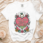 White t-shirt with "This Girl Needs a Spicy Marg" graphic featuring a margarita and peppers.