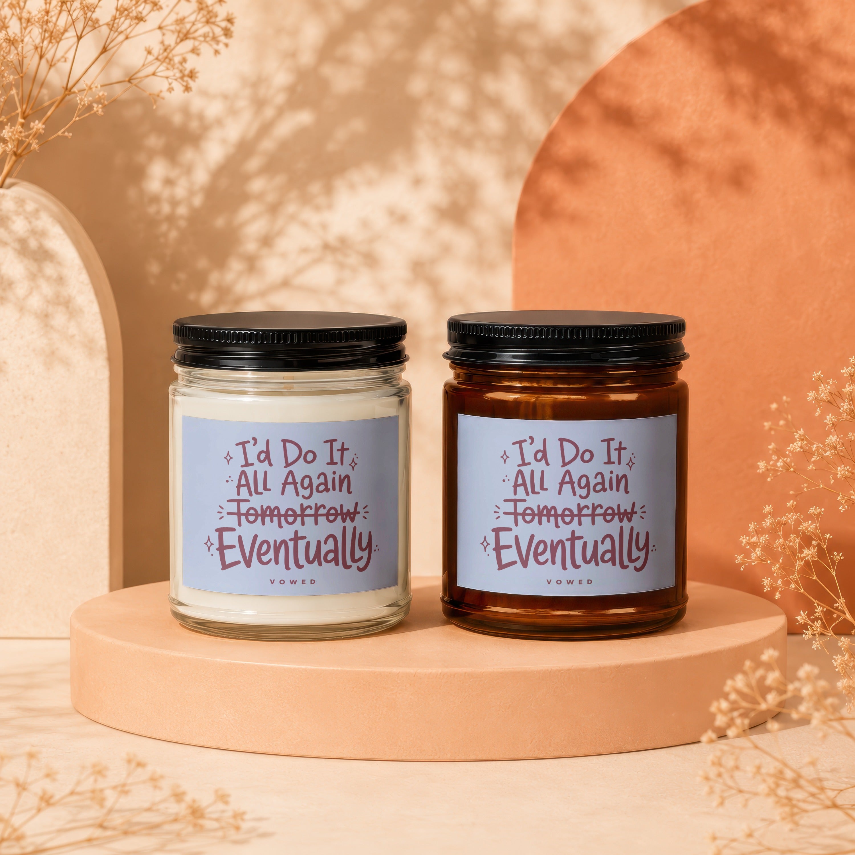 Two candles with text that reads "I'd Do It All Again Tomorrow Eventually."