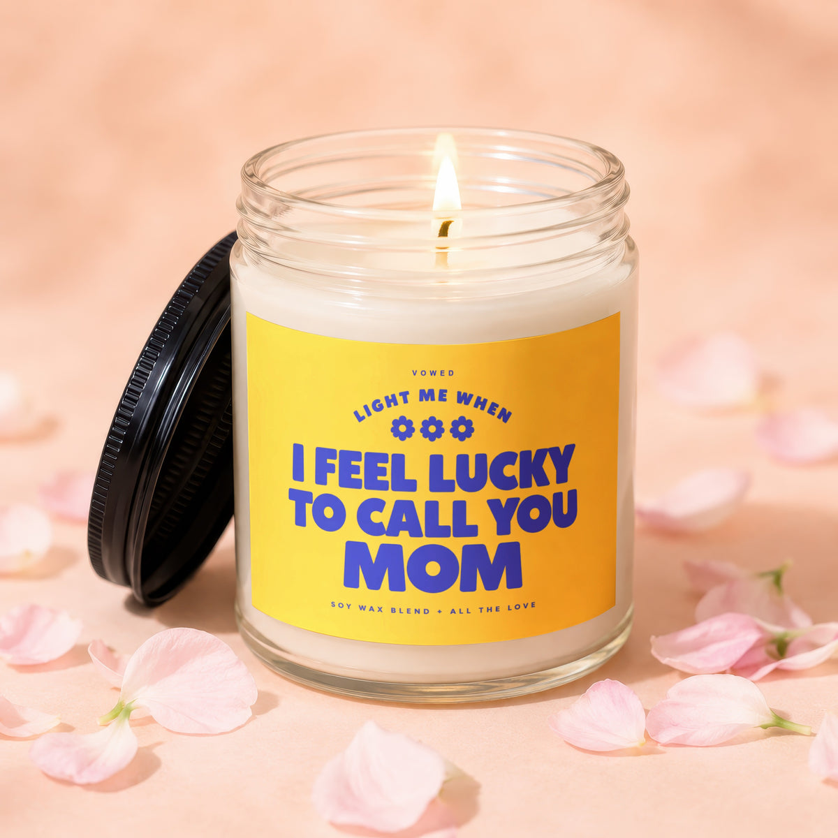 Soy wax candle with "I Feel Lucky to Call You Mom" text on yellow label.