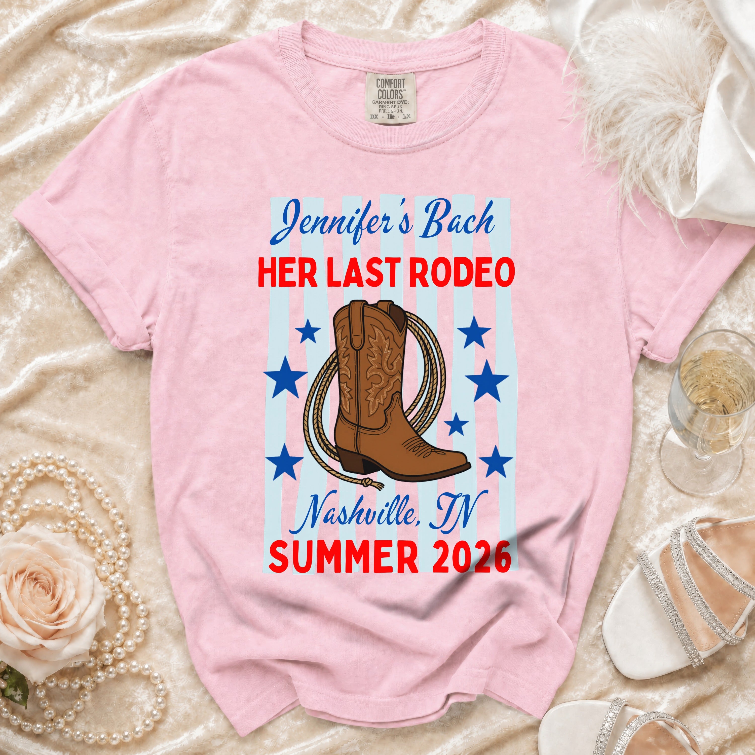 Pink t-shirt with "Jennifer's Bach Her Last Rodeo Nashville, IN Summer 2026" text and cowboy boot graphic.