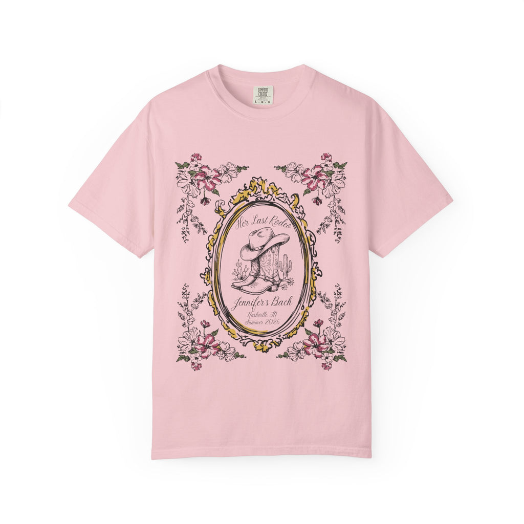 Pink t-shirt with "Her Last Rodeo" and cowboy boot graphic.