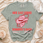 Pink cowboy hat and bandana graphic on gray t-shirt with text.