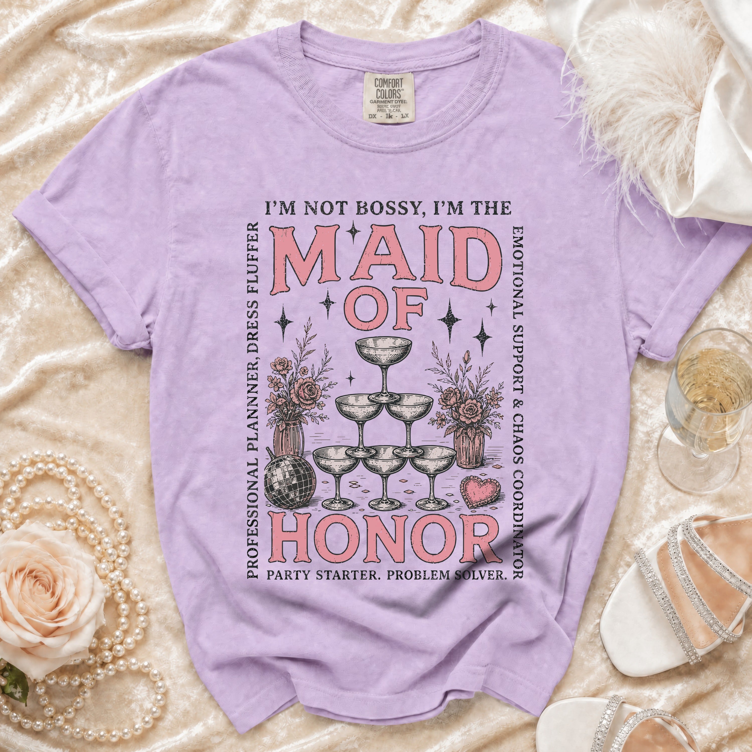 Purple t-shirt with "Maid of Honor" graphic and wedding-themed icons.
