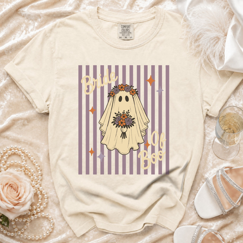 Cream t-shirt with "Bride of Boo" ghost graphic on purple stripes.