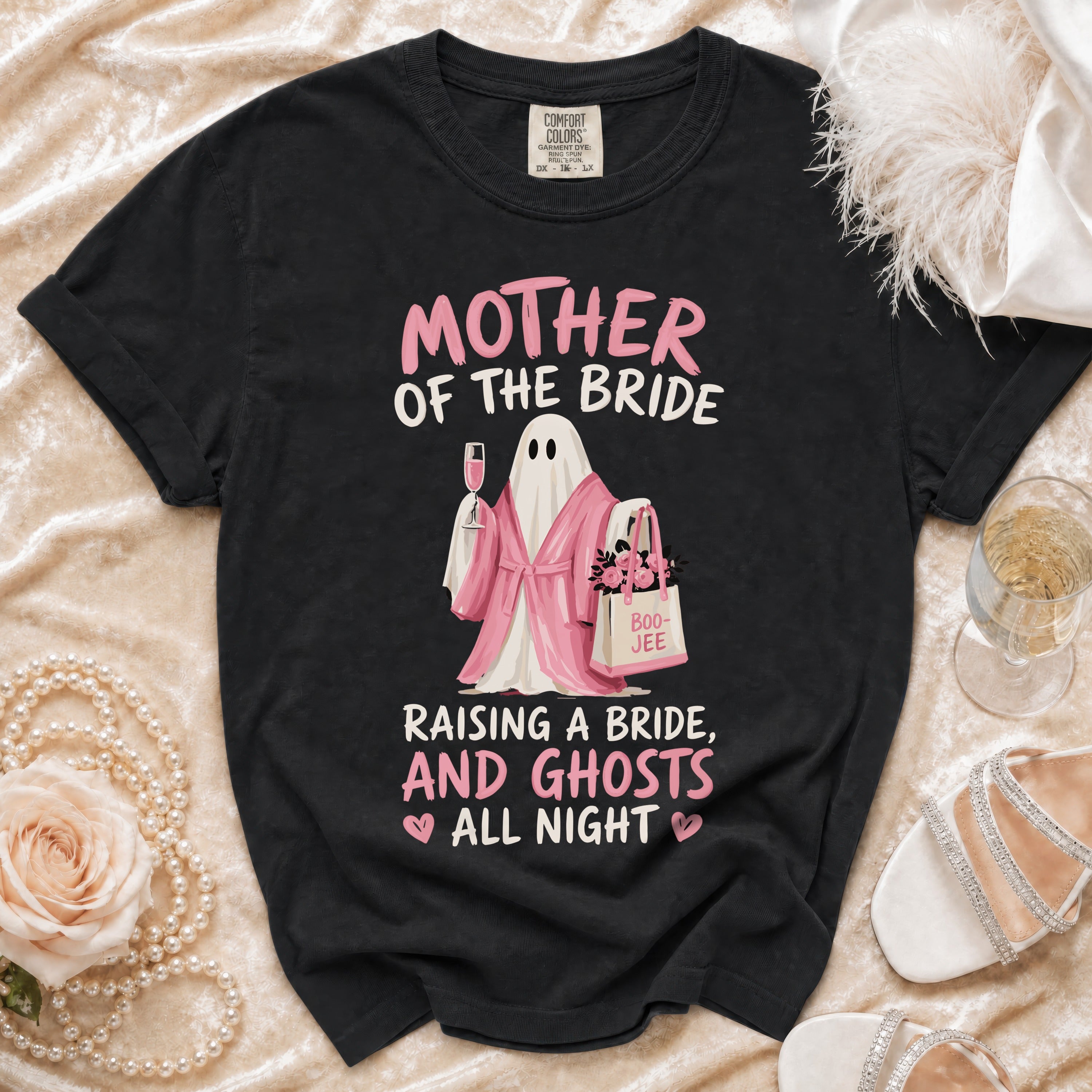 Black t-shirt with ghost graphic reading "Mother of the Bride Raising a Bride, and Ghosts All Night."