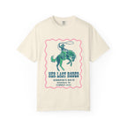 Cream t-shirt with green cowboy riding horse and text "HER LAST RODEO".