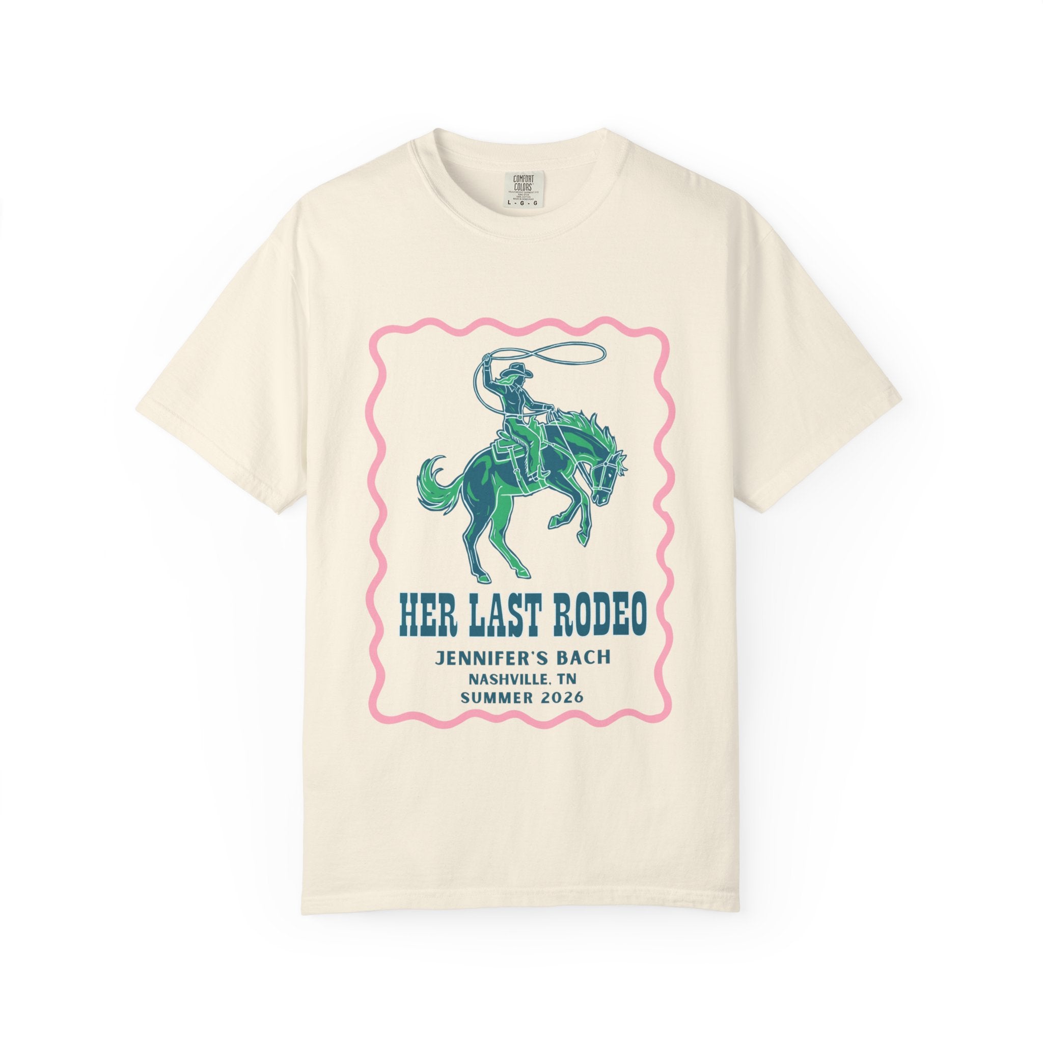 Cream t-shirt with green cowboy riding horse and text "HER LAST RODEO".