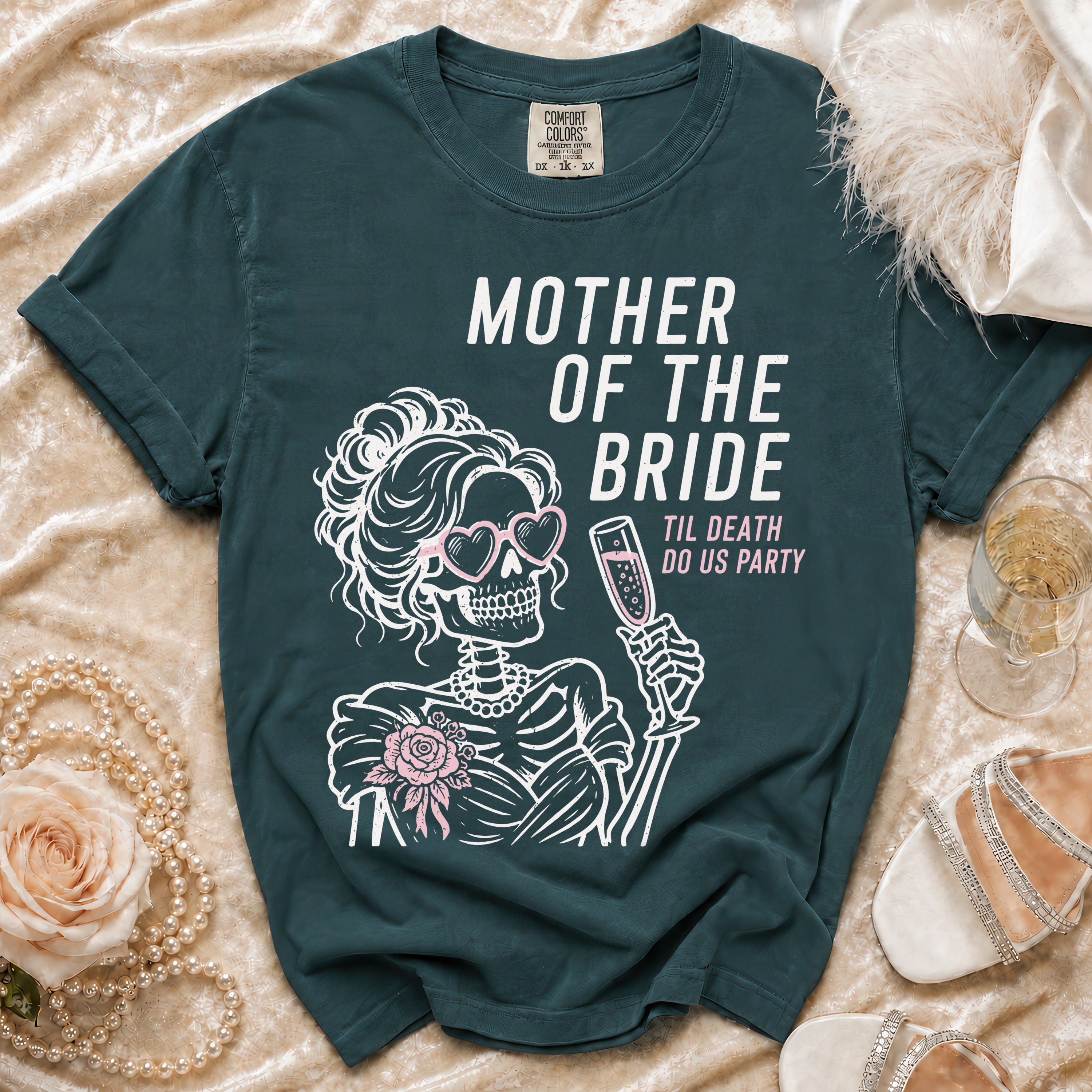 Teal t-shirt with skeleton bride graphic reading "Mother of the Bride, Til Death Do Us Party."