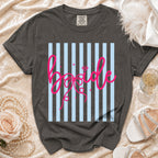 Dark gray t-shirt with "Bride" in pink cursive on blue and gray stripes.
