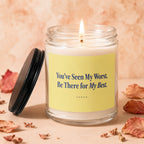 Lit candle in glass jar with yellow label reading "You've Seen My Worst. Be There for My Best. vowed."