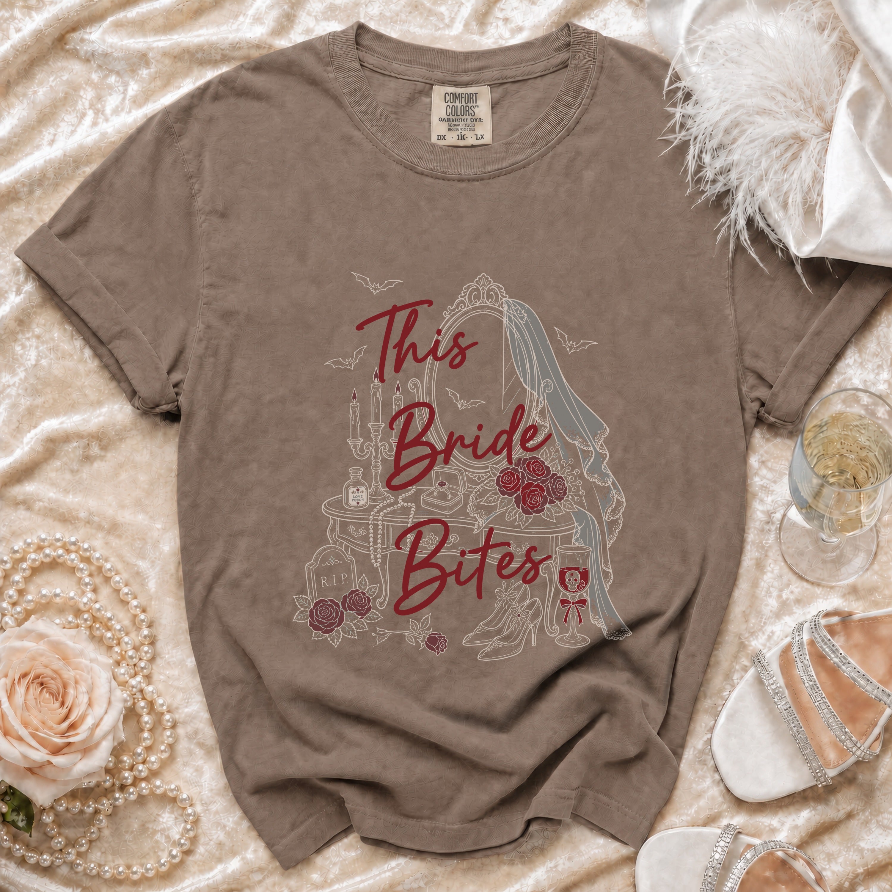 Brown t-shirt with "This Bride Bites" graphic, featuring a vanity, roses, and bats.