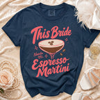 Navy t-shirt with "This Bride Needs an Espresso Martini" graphic.