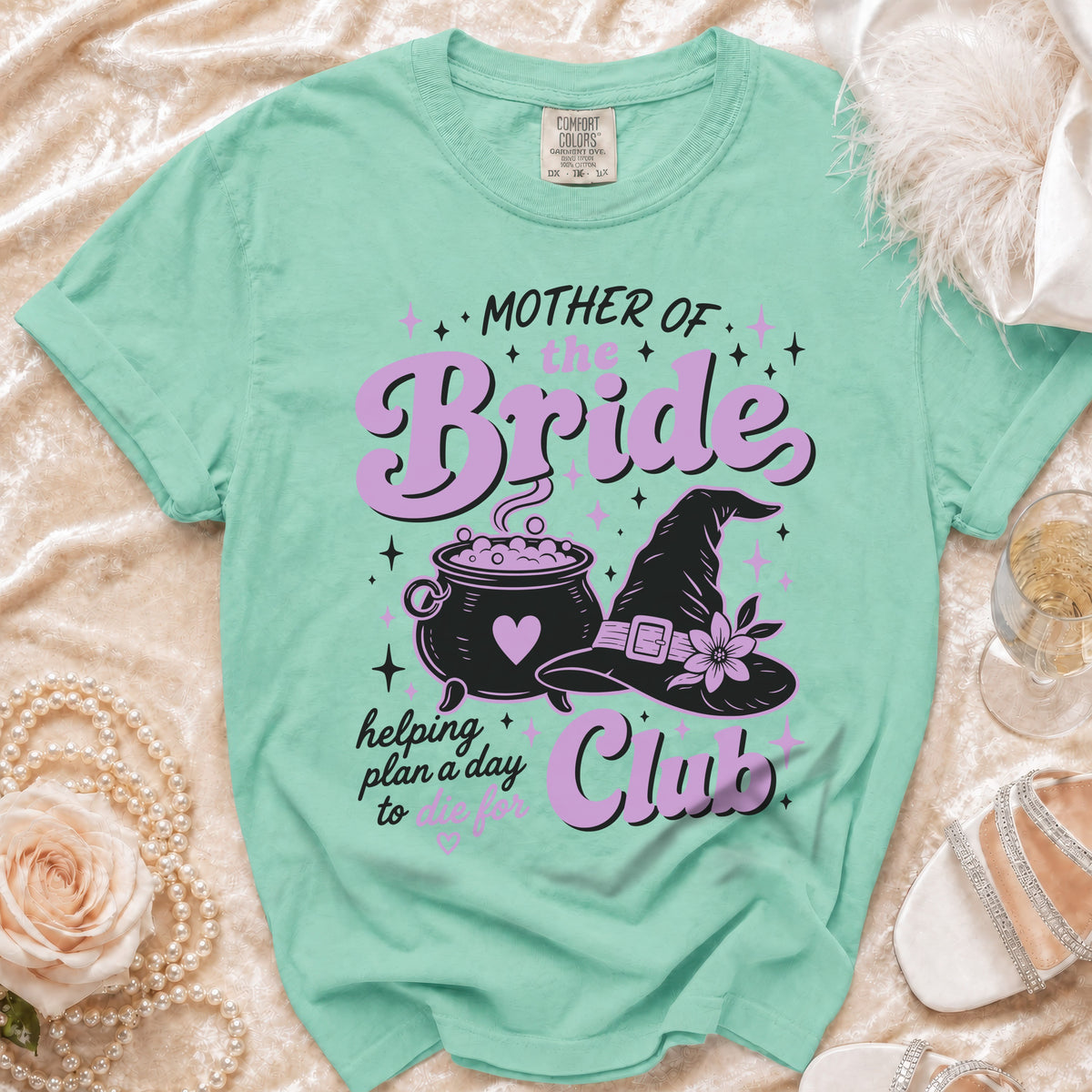 Mint green t-shirt with "Mother of the Bride Club" in purple text.