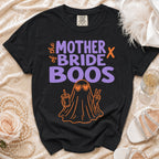 Black Comfort Colors t-shirt with "The Mother of the Bride Boos" text and ghost graphic.
