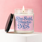 Jar candle with pink label that says "She Said Maybe Yes AND SHE MEANT IT VOTED".