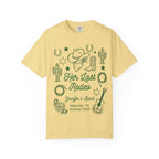 Yellow t-shirt with "Her Last Rodeo" design, cowboy hat, boots, and cactus.