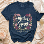 Navy t-shirt with "Mother of the Groom" and floral design.